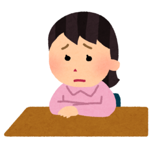 職場で人間関係のトラブルや派閥に頭を悩ませて落ち込んでいる福祉職員のイラスト