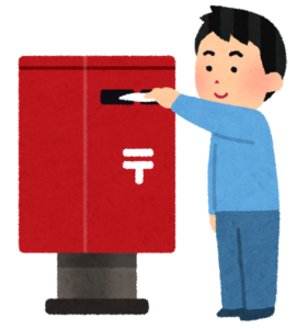 完成したお礼状をポストに投函する人