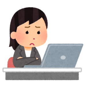 パソコンの前で頭を抱えて障害者施設における行事企画書作成に悩む職員のイラスト